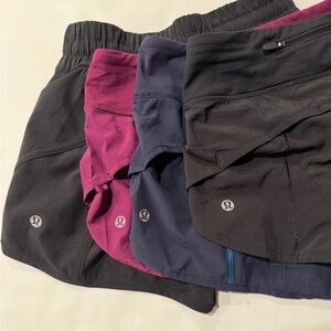 4 lululemon athletica Black, Plum, Navy Athletic Shorts. Used.lots of life left!